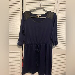 Dress in navy blue with pleather trim in black size 1x.